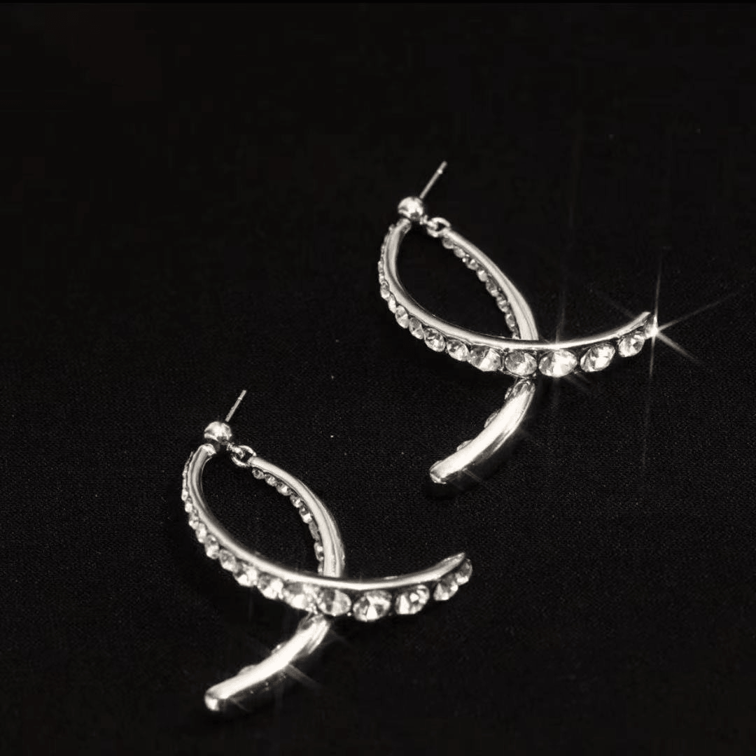 Boucles d'oreilles courbées Lighteme avec strass de luxe