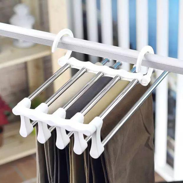 With a cap at the end of every rod, the hanger will prevent your trousers from slipping off