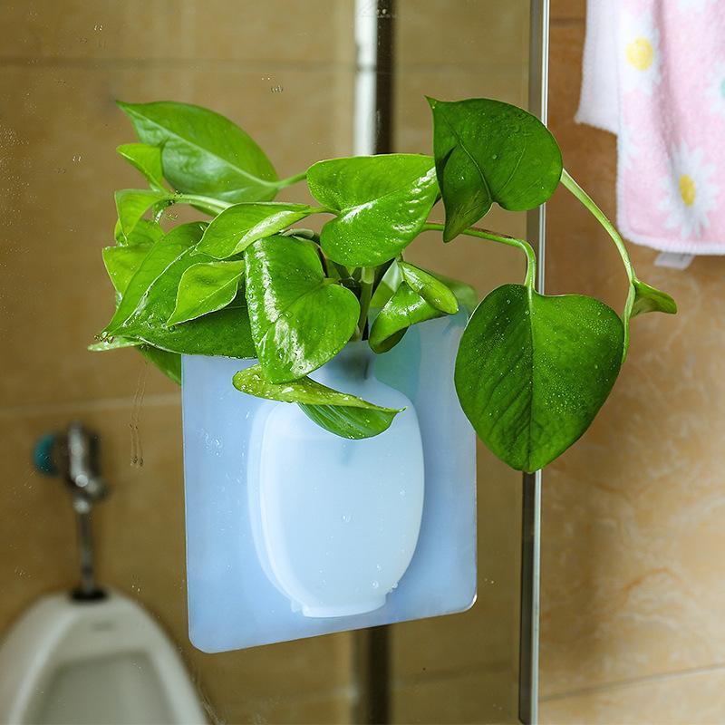 This is a removable silicone vase that can stick to any flat surface