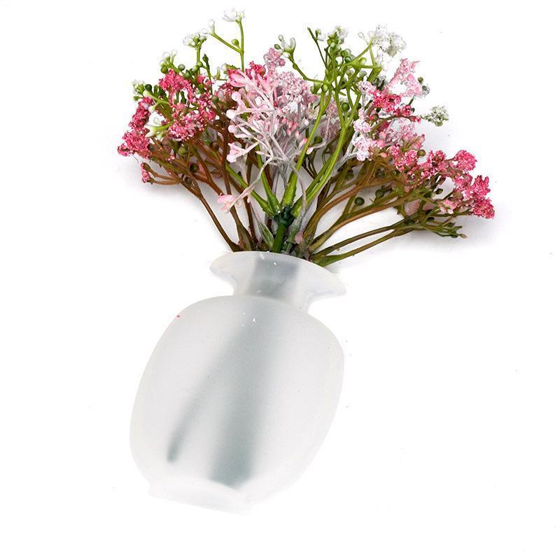 This is a removable silicone vase that can stick to any flat surface