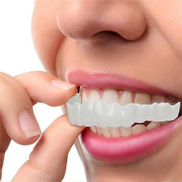 It is DESIGNED to look like a NATURAL SET OF TEETH.